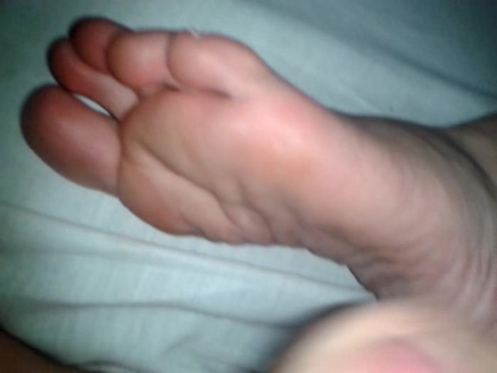 Членом по ступне